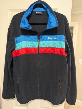 cotopaxi Navy Fleece Jacket with Blue, Teal & Red Stripes